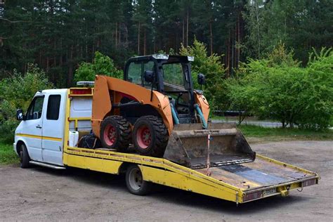 can a gmc sierra 1500 tow a skid steer|can gmc tow skid steer.